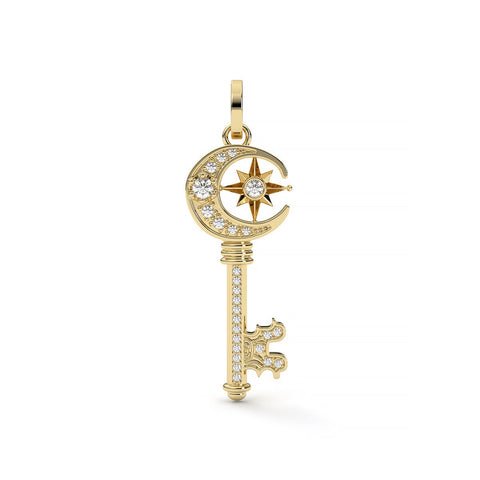 Gold key-shaped pendant with star and moon design on a white background